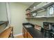 Convenient wet bar with sink and storage, great for serving drinks and snacks at 1466 Arrow Wind Ter, Charleston, SC 29414