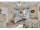 Cozy bedroom features two beds, natural light, and neutral décor at 1600 Long Grove Dr # 1727, Mount Pleasant, SC 29464