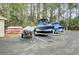 Outdoor boat storage area with several boats on trailers and kayaks, convenient for water enthusiasts at 1600 Long Grove Dr # 1727, Mount Pleasant, SC 29464