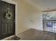 Entryway of unit 1727 with covered landing and wreath on the front door at 1600 Long Grove Dr # 1727, Mount Pleasant, SC 29464