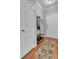 View of entryway with coat rack, shoe bench, and hardwood floors at 1600 Long Grove Dr # 1727, Mount Pleasant, SC 29464