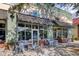 Exterior of ZY's ice cream parlor with outdoor tables and chairs under a shaded awning at 1600 Long Grove Dr # 1727, Mount Pleasant, SC 29464
