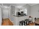 Bright kitchen with stainless steel appliances and breakfast bar, creating an inviting space at 1600 Long Grove Dr # 1727, Mount Pleasant, SC 29464