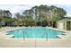 Sparkling community pool with lounge chairs offers a refreshing escape for residents on a sunny day at 1600 Long Grove Dr # 1727, Mount Pleasant, SC 29464