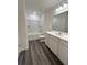 Bathroom featuring a shower-tub combination, vanity with a sink, and a large mirror at 2204 Scarlett Maple St, Summerville, SC 29486