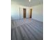 Spacious main bedroom offers plush carpeting, neutral walls, and an en-suite bathroom at 2204 Scarlett Maple St, Summerville, SC 29486