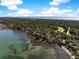 Stunning aerial view of a coastal community with homes nestled along the marsh at 176 Marsh Hawk Ln, Kiawah Island, SC 29455