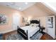 Cozy bedroom features hardwood floors, a ceiling fan, and neutral wall paint at 176 Marsh Hawk Ln, Kiawah Island, SC 29455