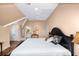 Spacious bedroom features a large bed and view to the ensuite bathroom at 176 Marsh Hawk Ln, Kiawah Island, SC 29455