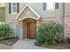 Charming home with brick facade and inviting front entrance at 176 Marsh Hawk Ln, Kiawah Island, SC 29455