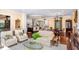 Cozy living area with an open floor plan and kitchen view at 176 Marsh Hawk Ln, Kiawah Island, SC 29455