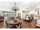 Open concept living area with a kitchen and chandelier at 176 Marsh Hawk Ln, Kiawah Island, SC 29455