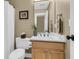 Bathroom featuring a toilet, vanity with modern faucet and a shower with a curtain at 1992 Pierce St, Charleston, SC 29492