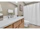 Bathroom featuring a white vanity, modern faucet, and a shower with a curtain at 1992 Pierce St, Charleston, SC 29492