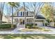 Well-maintained home with a two-car garage, beautiful landscaping, and an inviting front porch at 1992 Pierce St, Charleston, SC 29492
