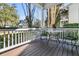 Cozy outdoor seating on the porch with a table, chairs, and scenic views at 1992 Pierce St, Charleston, SC 29492