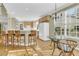 Bright, open kitchen with bar seating and adjacent breakfast area at 1992 Pierce St, Charleston, SC 29492