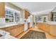 Spacious kitchen featuring wooden cabinets, ample counter space, and bright natural light at 1992 Pierce St, Charleston, SC 29492