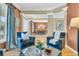 Cozy living room showcasing stylish seating, a glass table, and elegant decor at 1992 Pierce St, Charleston, SC 29492