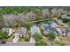 Aerial view of a home with a pond, showcasing its serene and private setting at 2128 Baldwin Park Dr, Mount Pleasant, SC 29466