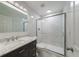 Stylish bathroom featuring a walk-in shower, sleek vanity, and elegant marble accents at 2128 Baldwin Park Dr, Mount Pleasant, SC 29466