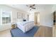 Spacious bedroom with a ceiling fan, a plush bed, and a doorway to the next room at 2128 Baldwin Park Dr, Mount Pleasant, SC 29466