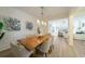 Elegant dining room featuring modern decor, wood floors, and seamless access to other rooms at 2128 Baldwin Park Dr, Mount Pleasant, SC 29466