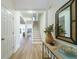 Welcoming foyer with stylish decor, wood floors, and an inviting entryway at 2128 Baldwin Park Dr, Mount Pleasant, SC 29466