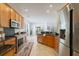Well-equipped kitchen with stainless steel appliances, granite countertops, and wood cabinetry at 2128 Baldwin Park Dr, Mount Pleasant, SC 29466