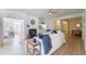 Open-concept living room featuring a fireplace, built-in shelves, and views of the dining room at 2128 Baldwin Park Dr, Mount Pleasant, SC 29466