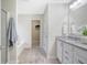 A bright bathroom with double vanity, granite countertop, and shower with glass door at 222 Medford Dr, Summerville, SC 29485