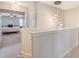 Upstairs hallway with modern pendant lighting fixtures looking into a bedroom at 222 Medford Dr, Summerville, SC 29485