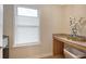 Bright laundry room features a window, folding counter and ample storage options at 222 Medford Dr, Summerville, SC 29485