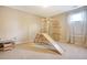 Bright playroom featuring wooden play structures and soft carpet flooring at 222 Medford Dr, Summerville, SC 29485