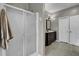 Bathroom featuring a glass-door shower, vanity with framed mirror, and tiled floors at 223 Fox Field Rd, Walterboro, SC 29488