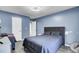 Primary bedroom with hardwood floors, a bed, and windows providing natural light at 223 Fox Field Rd, Walterboro, SC 29488