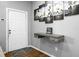 Hallway area shows art and modern table at 223 Fox Field Rd, Walterboro, SC 29488