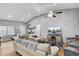 Spacious living room is enhanced by abundant natural light, sleek furnishings, and recessed lighting at 223 Fox Field Rd, Walterboro, SC 29488