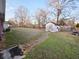 Large backyard with a storage shed and mature trees at 228 Jean Wells Dr, Goose Creek, SC 29445