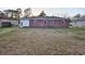 Backyard featuring a well-maintained lawn and a brick exterior at 228 Jean Wells Dr, Goose Creek, SC 29445