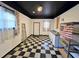 Spacious basement with a checkered floor, utility sink, and natural light at 228 Jean Wells Dr, Goose Creek, SC 29445