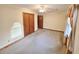 Bright bedroom with neutral carpet, ceiling fan, and a large window at 228 Jean Wells Dr, Goose Creek, SC 29445