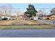 A cozy single-story home with brick accents, a driveway, and a peaceful neighborhood setting at 228 Jean Wells Dr, Goose Creek, SC 29445
