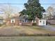 Charming single-story brick home featuring a well-maintained front yard and a comfortable, inviting curb appeal at 228 Jean Wells Dr, Goose Creek, SC 29445