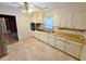Well-lit kitchen featuring ample cabinet space and a double sink, ideal for cooking and storage at 228 Jean Wells Dr, Goose Creek, SC 29445