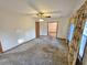 Spacious living room with neutral carpeting, light walls, and a ceiling fan creating a bright and inviting atmosphere at 228 Jean Wells Dr, Goose Creek, SC 29445