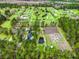 An aerial view of the property and neighborhood with mature trees and landscaping at 2285 Cooper Store Rd, Moncks Corner, SC 29461