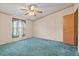 Bedroom with wall to wall carpet, ceiling fan, and a window offering natural light at 2285 Cooper Store Rd, Moncks Corner, SC 29461