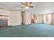 Spacious living room showcasing a fireplace and a view leading into the kitchen at 2285 Cooper Store Rd, Moncks Corner, SC 29461