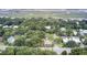 Scenic aerial shot of the neighborhood with beautiful marsh views and lush green landscape at 2530 Jasper Blvd, Sullivans Island, SC 29482